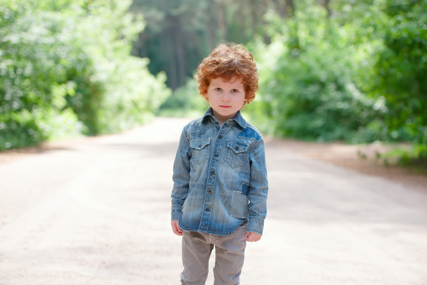 cute little emotional boy outdoors - Foto, imagen