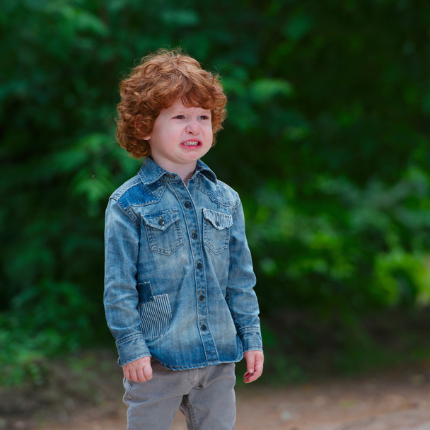 cute little emotional boy outdoors - Фото, зображення