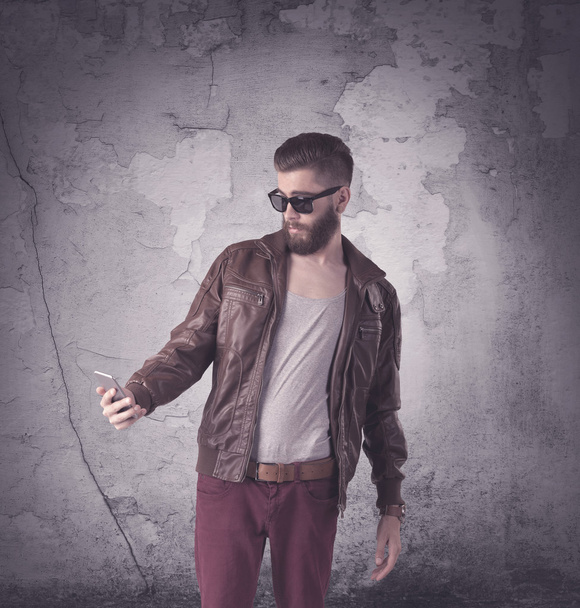 Handsome hipster in fashion clothing - Фото, изображение