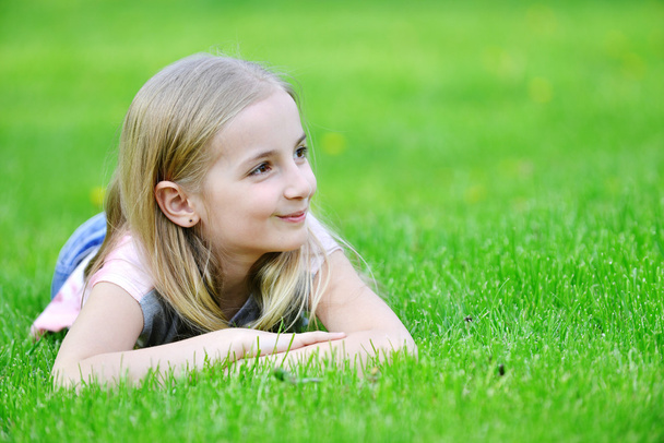 Little girl on grass - Zdjęcie, obraz
