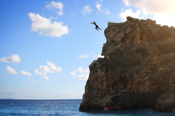 Cliff jump in the ocean - Photo, Image