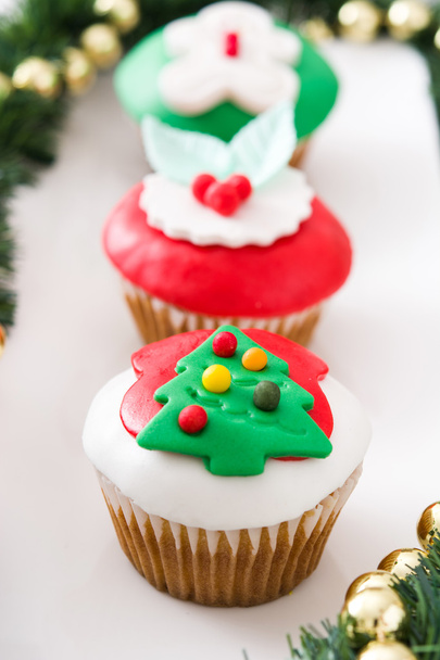 Christmas cupcakes and Christmas decoration - Фото, изображение