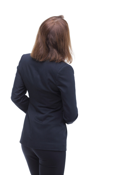 Young businesswoman looking at something. Back view - Photo, image
