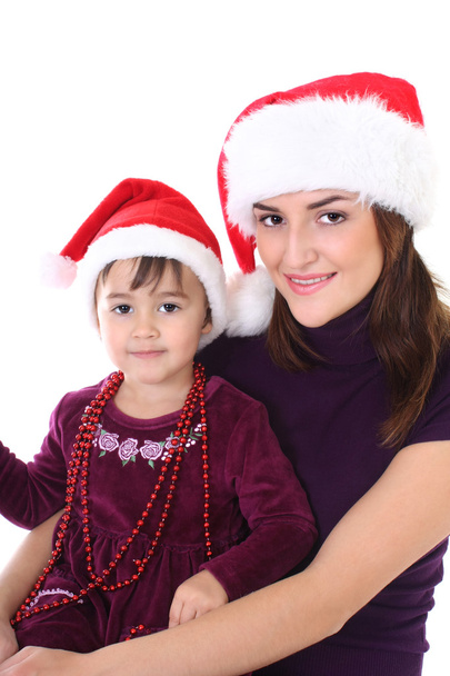 Happy mother and daughter in santa hat - Foto, Bild