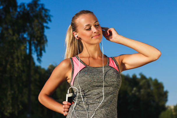 Young attractive woman listening to music - Photo, Image