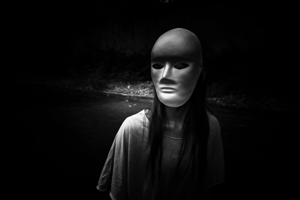 Dark doctrine,Mysterious woman wearing white mask,Scary background for book cover - Foto, Imagem