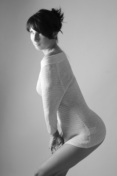 Sexy woman in cardigan posing black and white - Foto, imagen