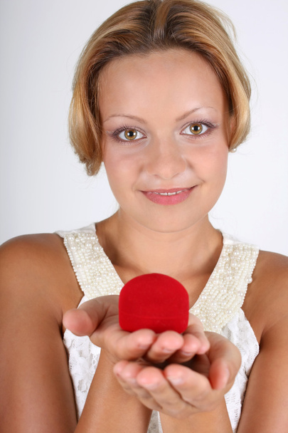 Woman with red box for jewellery - Zdjęcie, obraz