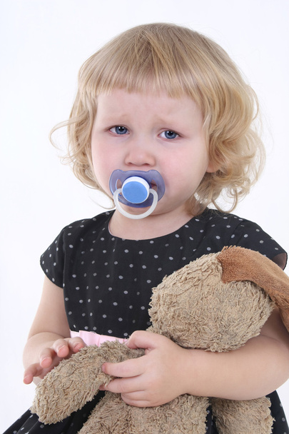 Little girl with toy crying - Valokuva, kuva