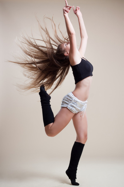 Modern ballet dancer dancing on the white studio background - Photo, Image