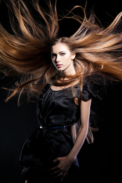 Closeup portrait of glamour young girl with beautiful long hair - Фото, зображення