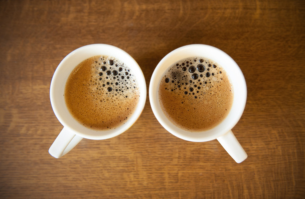 Two whte cups with espresso - Φωτογραφία, εικόνα