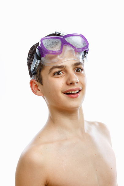 Boy diver in swimming mask with a happy face close-up portrait, isolated on white - Фото, изображение