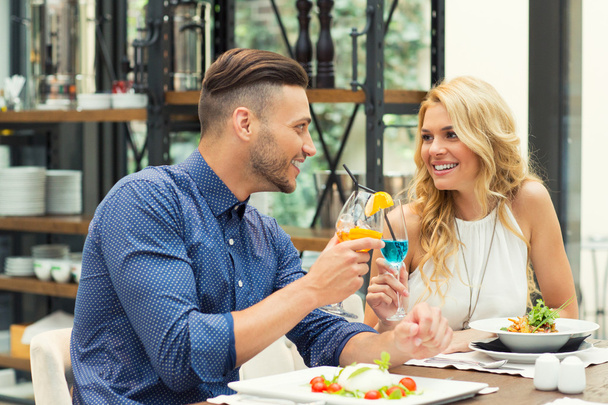 Beautiful couple on a date in restaurant - Foto, immagini