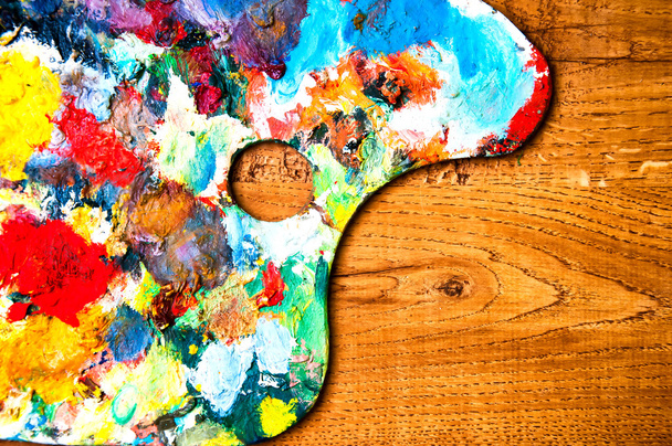 Painting palette on wooden background - Photo, Image