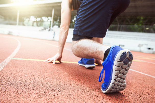 Athlete runner feet running on treadmill closeup on shoe - Fotografie, Obrázek