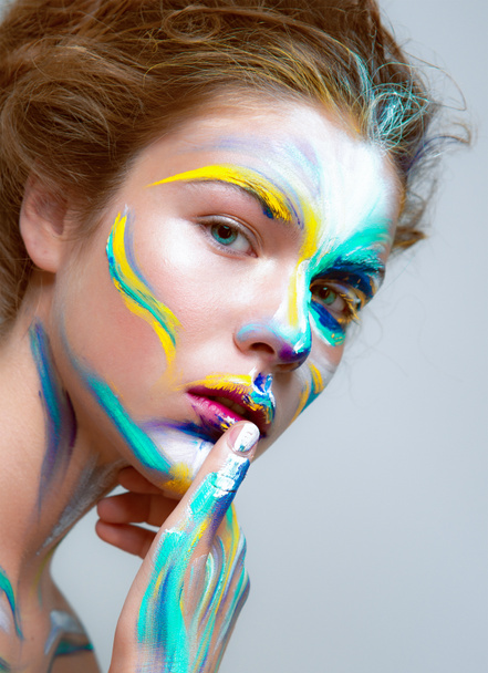 Painted beautiful woman face, artistic make up - 写真・画像