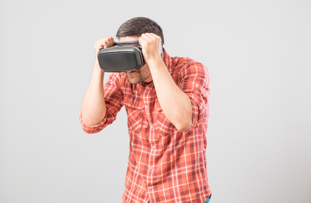Man in fighter stand with virtual reality glasses - 写真・画像