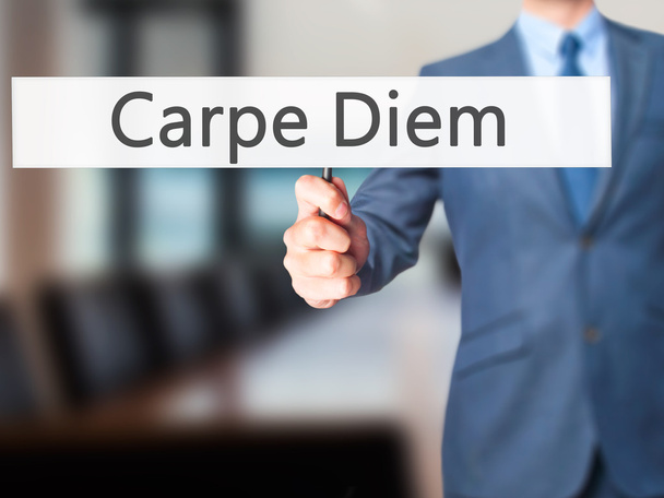 Carpe Diem - Business man showing sign - Photo, Image
