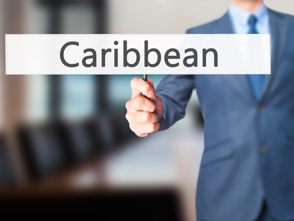 Карибский бассейн - бизнесмен подает знак
 - Фото, изображение