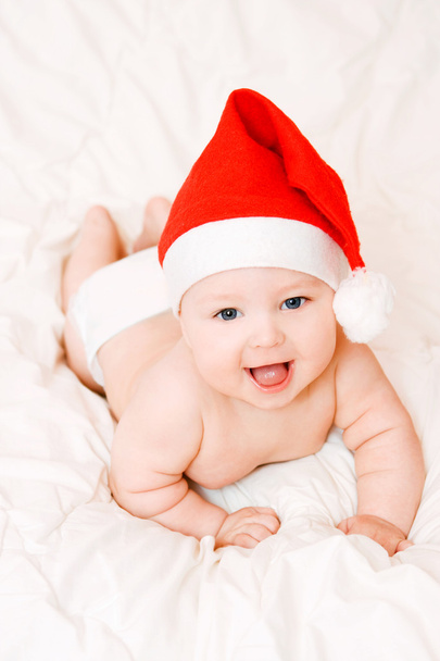 Baby in christmas hat - Foto, imagen