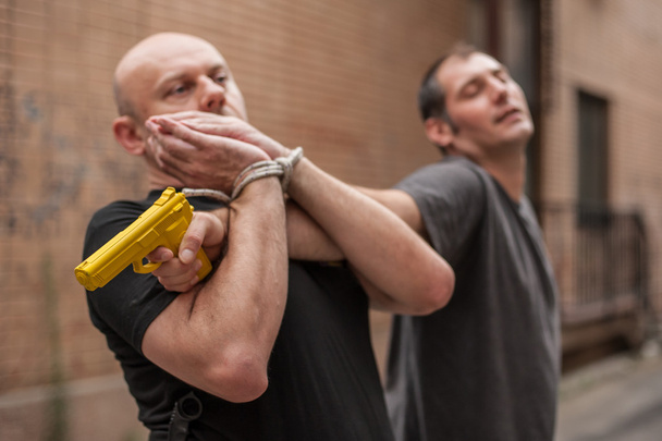 Self defense techniques against a gun - Foto, Imagen