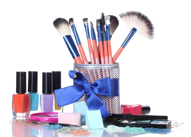 Make-up brushes in holder and cosmetics isolated on white - Foto, Imagem