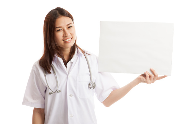 Young Asian female doctor show a blank sign. - Photo, image