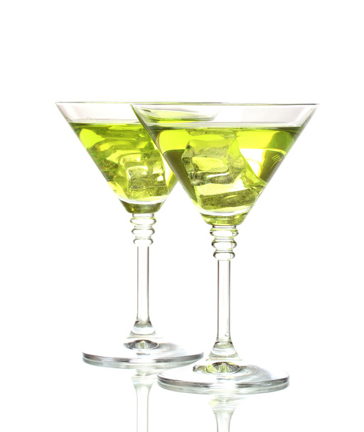 Yellow cocktail in martini glasses isolated on white - Foto, Imagem
