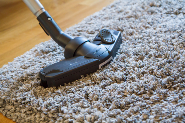 Vacuum cleaner to tidy up the living room - Photo, Image