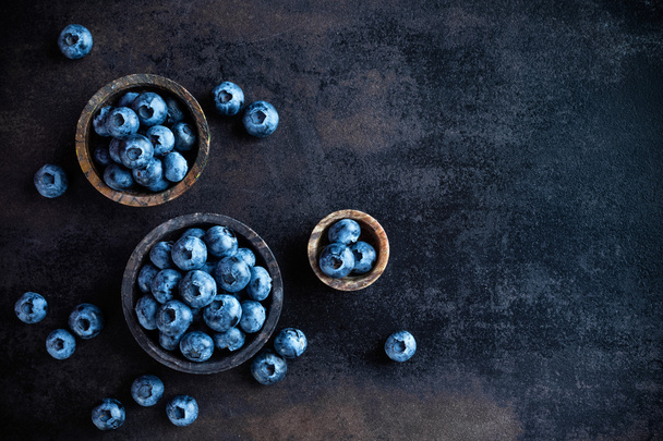 blueberry on dark background - Фото, изображение