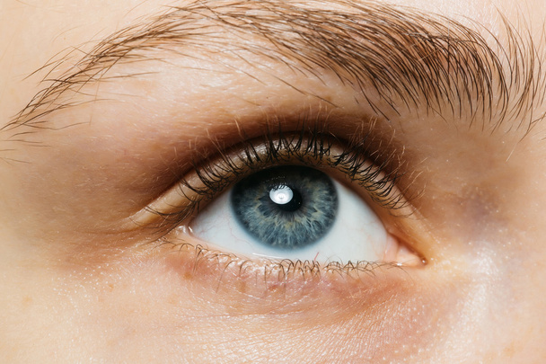 Close up of a blue eye - Zdjęcie, obraz
