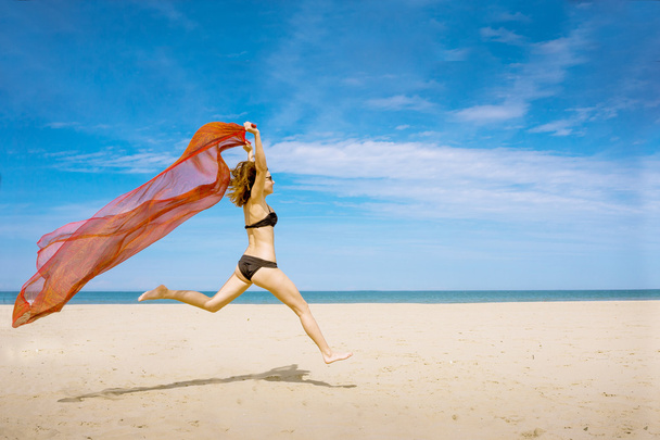 woman in bikini on beach - Valokuva, kuva
