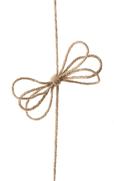 Rope with bowknot, isolated on white. - 写真・画像