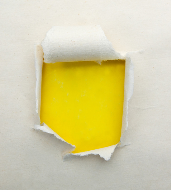 Torn paper with yellow background - Fotoğraf, Görsel