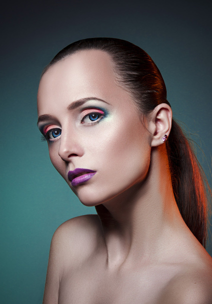 nice beautiful girl with blue eyes and lovely makeup on face - Fotoğraf, Görsel