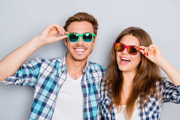 Portrait of happy smiling couple in love wearing spectacles - Photo, image