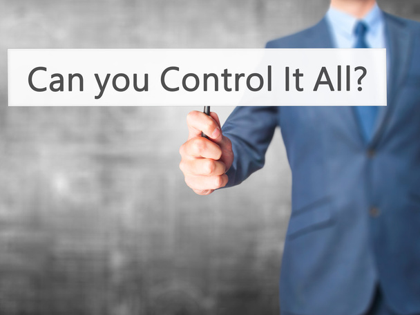 Can you Control It All ? - Business man showing sign - Foto, afbeelding
