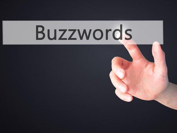Buzzwords - Mão pressionando um botão no conceito de fundo borrado
 - Foto, Imagem