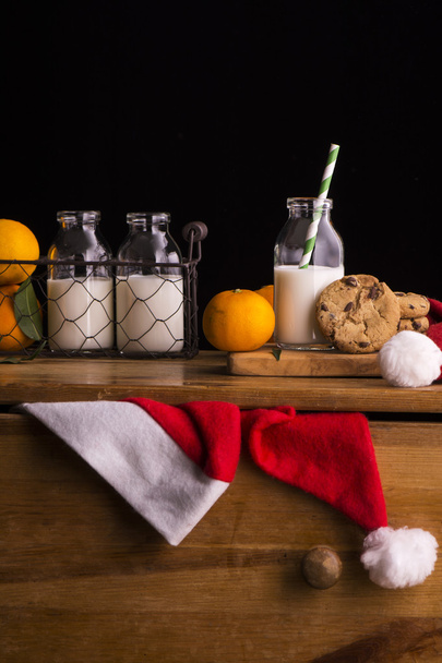 Xmas composition with milk and cookies for Santa - Photo, Image