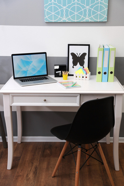 Stylish workplace with laptop - Фото, зображення