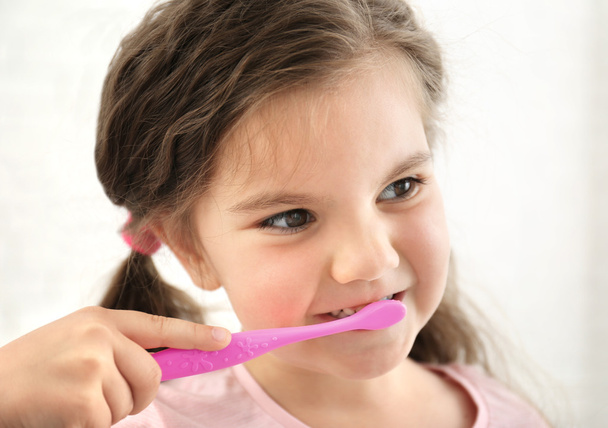 Cute girl with toothbrush  - Φωτογραφία, εικόνα