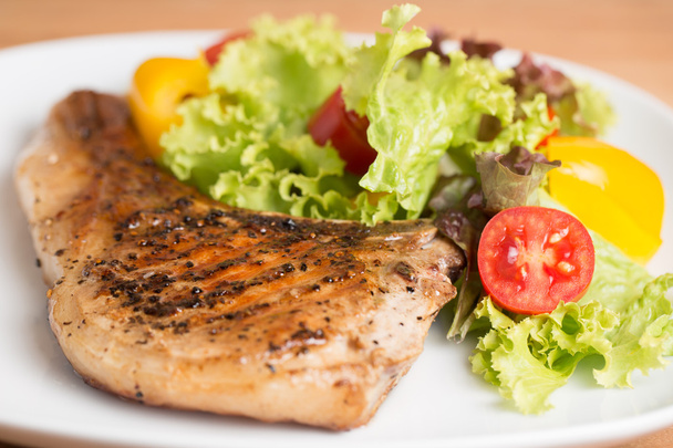 Grilled Pork chop prepare for serve to customer on the table. - Photo, Image