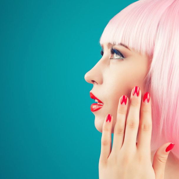 beautiful woman in red lipstick and nail polish  - 写真・画像