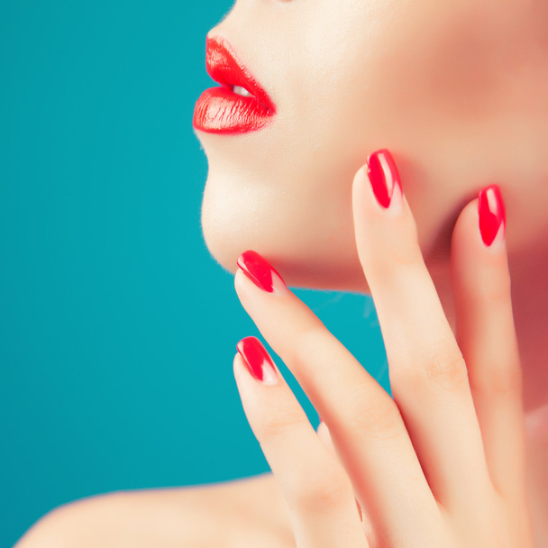 woman with  red lips and nails - Fotó, kép