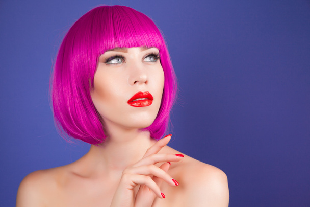 beautiful woman wearing colorful wig - Foto, Imagem