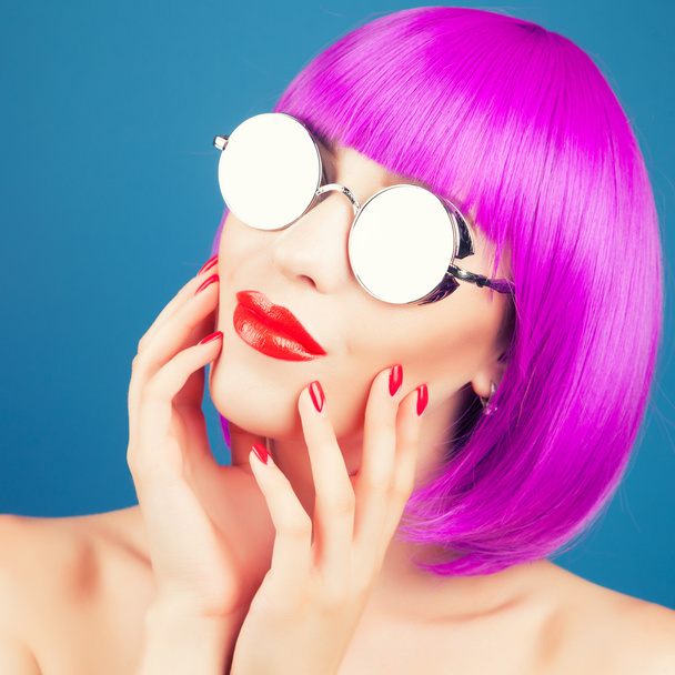 beautiful woman wearing colorful wig - Fotó, kép
