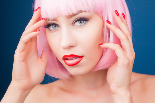 beautiful woman wearing colorful wig  - Фото, изображение