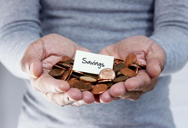 Plan de ahorro con monedas sueltas
 - Foto, Imagen