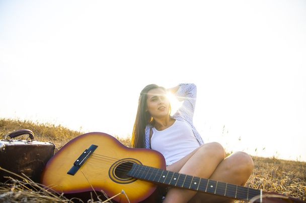 girl sitting with acoustic guitar - Photo, image